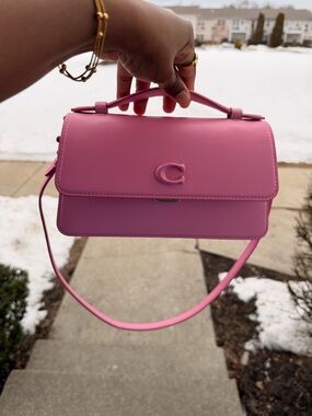 Coach Pink Top-Handle Juno Leather Crossbody bag